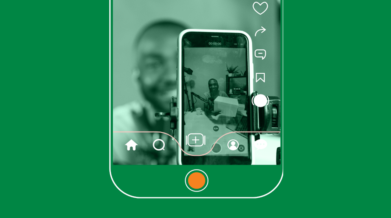 A doctor and patient captured through a phone camera frame